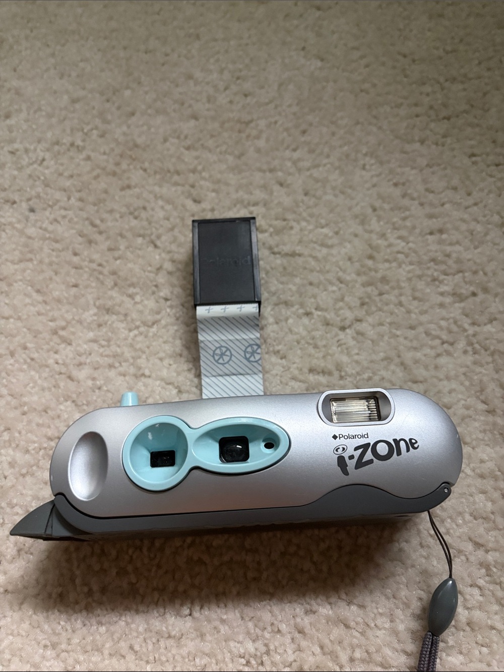 Polaroid Silver Instant Camera with Teal Accents
